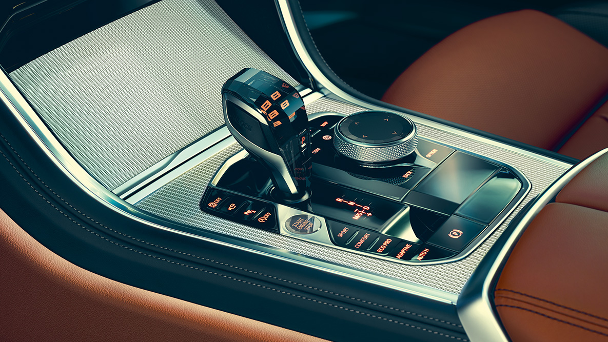 BMW 8 Coupé, középkonzol. Közeli felvétel a BMW 8 Coupé belső teréről, fókuszban a középkonzollal.