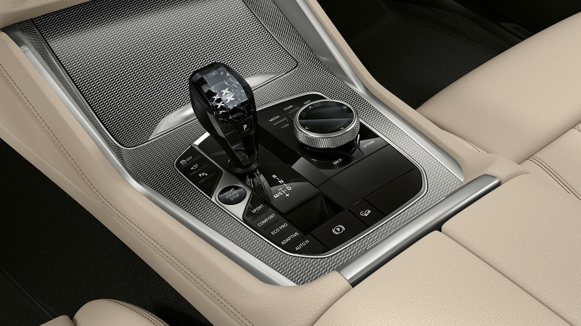 M Sport csomaggal ellátott BMW X6, középkonzol. Egy M Sport csomaggal ellátott BMW X6 belső tere a középkonzollal.