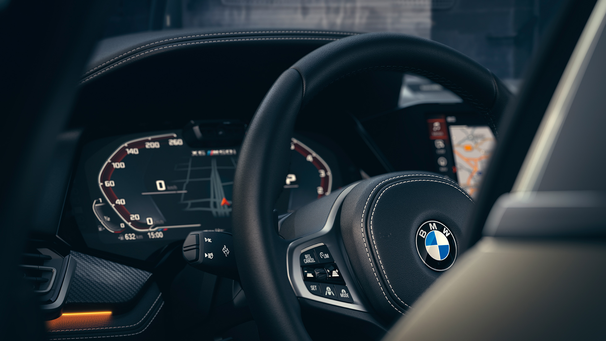 BMW vezetőt segítő rendszerek. A BMW X6 belső tere, fókuszban a műszeregység.