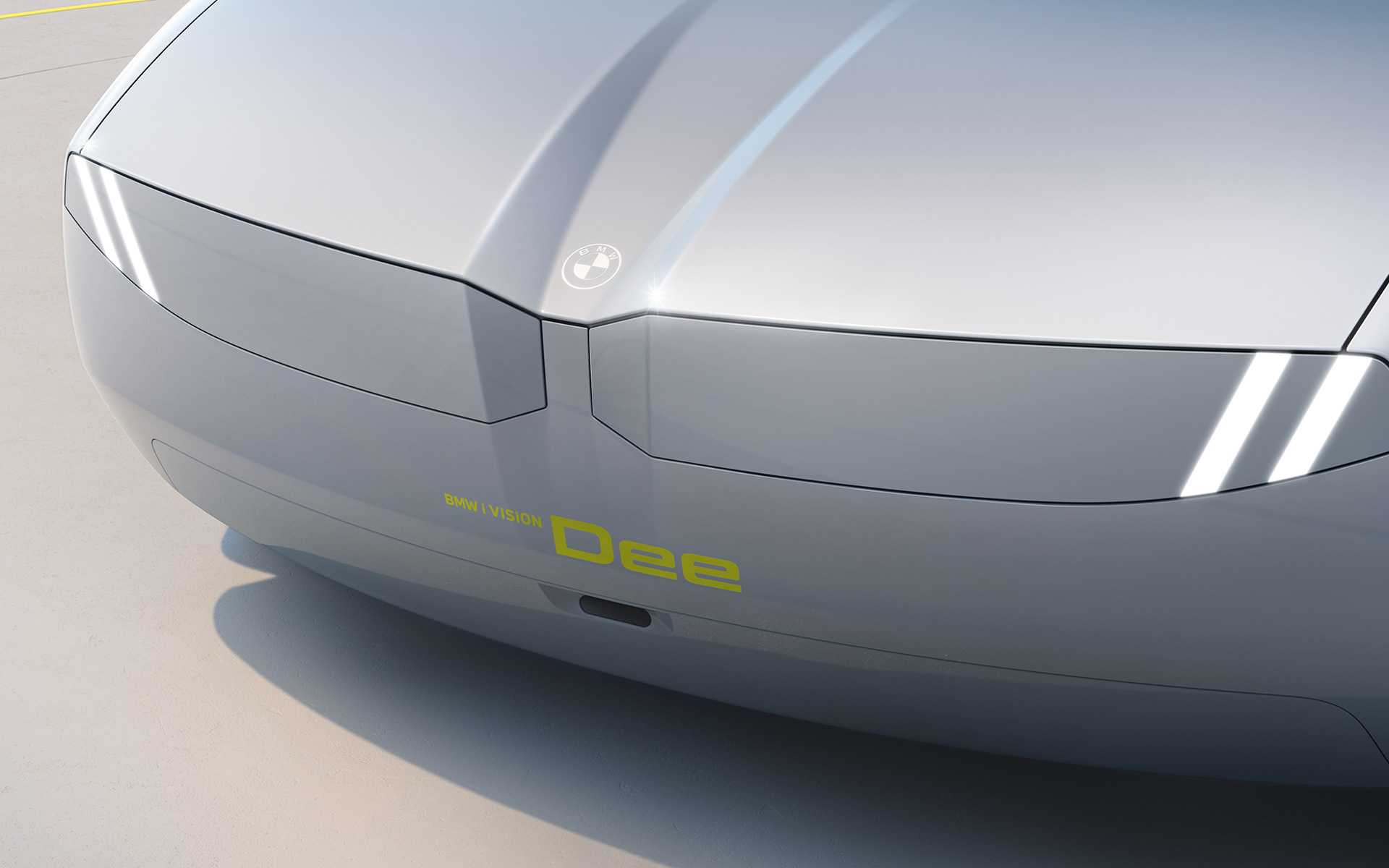 BMW i Vision Dee vizionárius jármű, külső dizájn, elölnézet Az első fényszórók és a BMW vese grafikailag egységes felületet alkotnak.
