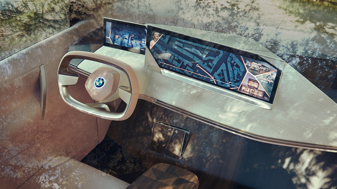 A BMW Vision iNEXT vezetőhelye A BMW Vision iNEXT vezetőhelye a kormánykerékkel és a műszerfallal